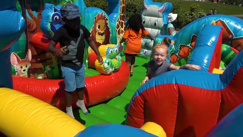 Bouncy playground slide at Big Give event.